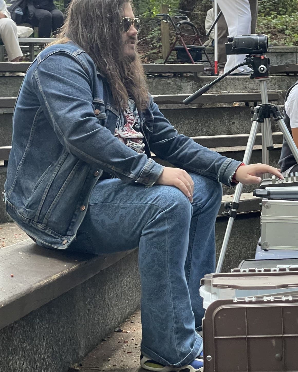 Andy Reay running sound at a live event, camera on a tripod alongside